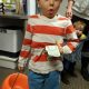 A child participating in Operation Gratitude Candy Buy Back at Lydiatt and Duru Family Dentistry.