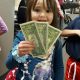 A child participating in Operation Gratitude Candy Buy Back at Lydiatt and Duru Family Dentistry.